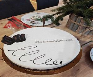 tort z napisem Klub Seniora Wigilia 2025